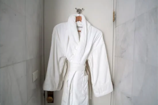 bathrobe hanging in bathroom