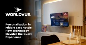 WorldVue logo and text saying "Personalisation in Middle East Hotels: How Technology Elevates the Guest Experience", with background image of an example Welcome screen of WorldVue HUB in Arabic, in a Middle East hotel room