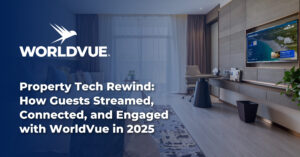 an image of a hotel room with a TV showing the WorldVue HUB, overlaid with the WorldVue logo and the blog title "Property Tech Rewind: How Guests Streamed, Connected, and Engaged with WorldVue in 2025"