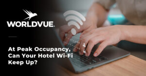 promo graphic for a WorldVue blog post titled "At Peak Occupancy, Can Your Hotel Wi-Fi Keep Up?"