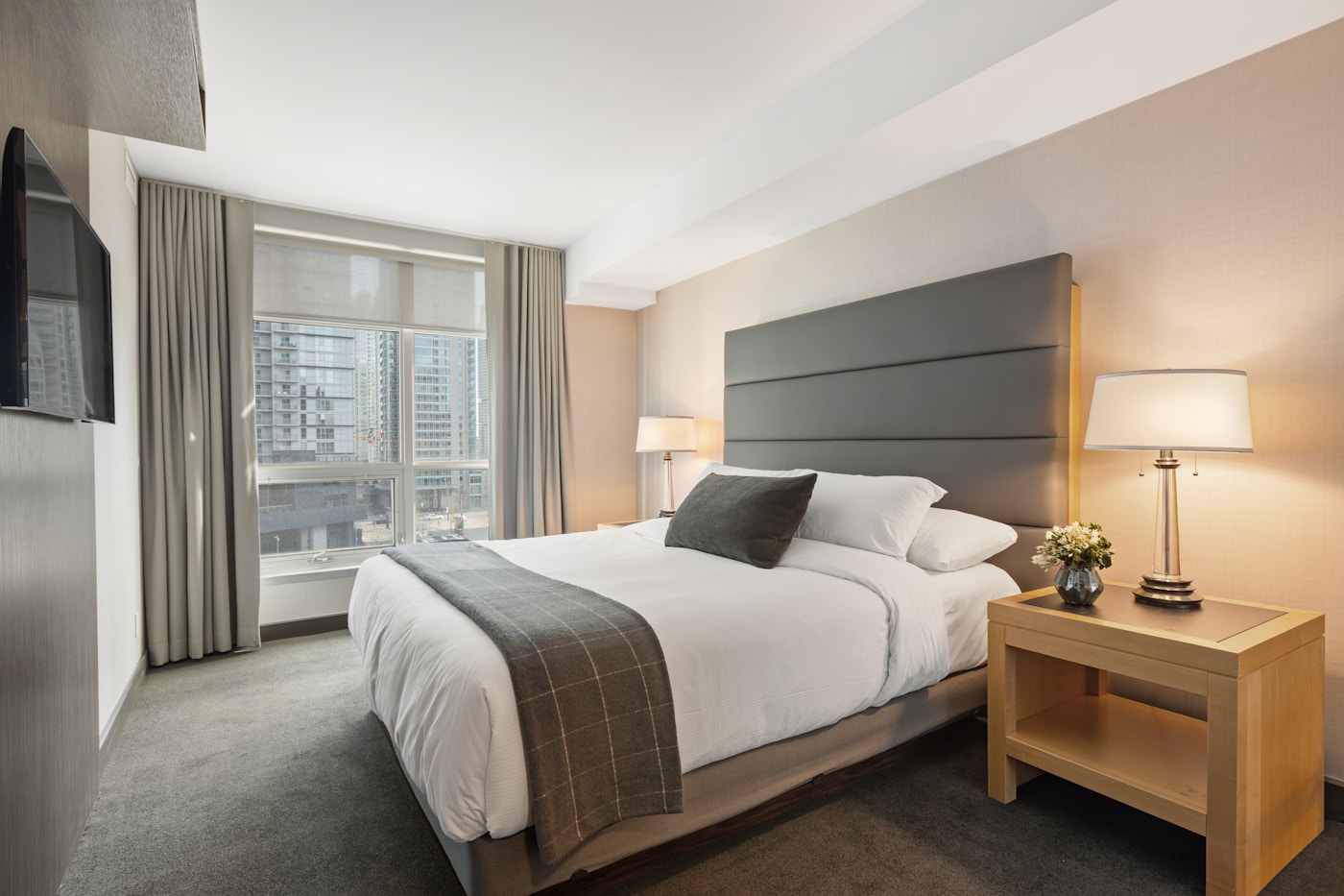 Guest relaxing in a personalized hotel room
