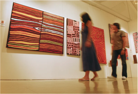 example of creative solutions- people walking through digital art gallery