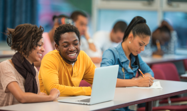 student housing connectivity being demonstrated by students collaborating on a laptop