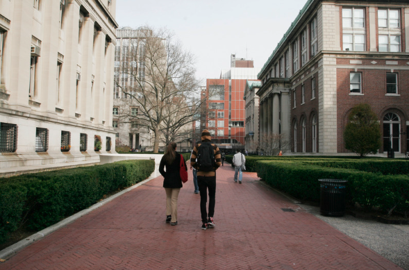 students walking through campus